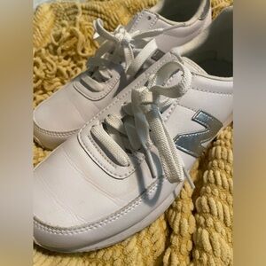 All white, leather new balance. Women’s 7.5 US. EUC. Some wrinkling. No stains.
